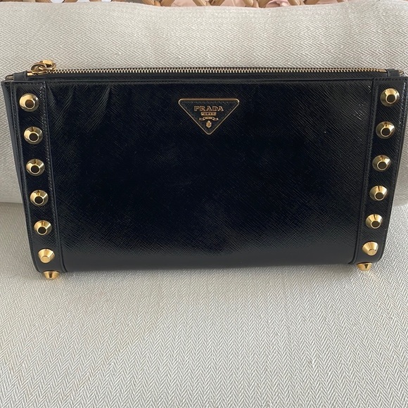 Prada Handbags - Prada Saffiano leather clutch